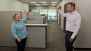 Maintaining A Clean And Healthy Work Environment: Handshake Alternatives